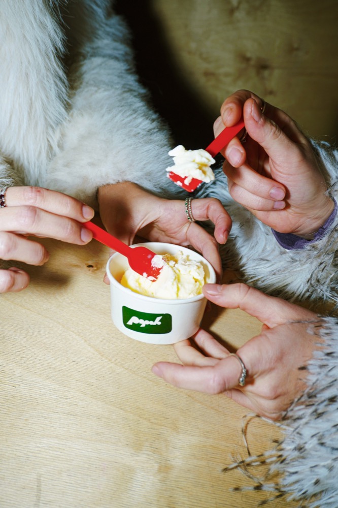Two spoons sharing gelato from a Popolo cup