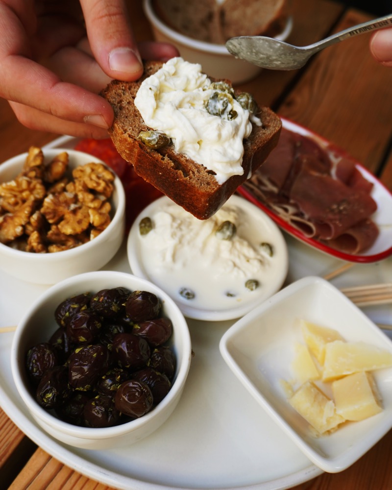 Rosé and antipasti shared at the table